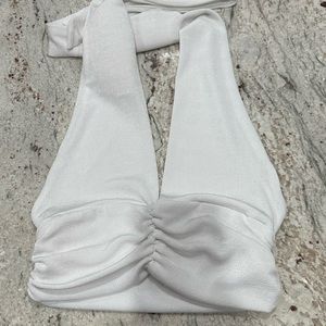Cute and stretchy AUTOMET cropped halter top, white, size M.